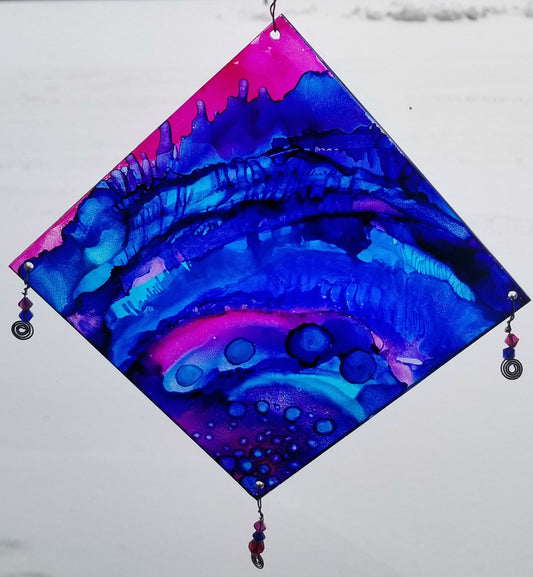 Suncatcher in blue, purple, and pink.